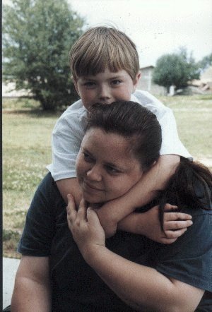 Lady Aislinn Chaomhanach and Adam the Undecided at a Pine Log Park fighter practice in the summer of A.S. XXXII (1998)
