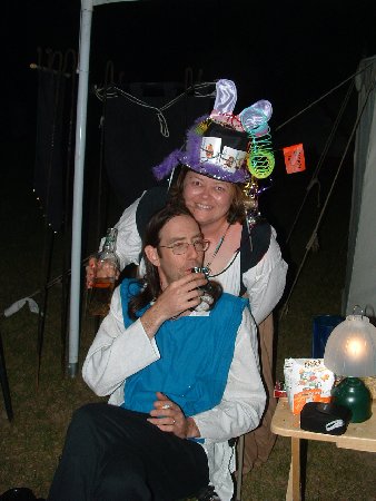 THLady Aislinn Chaomhanach serving the guests at Fool's War, April A.S. XXXVIII (2004)