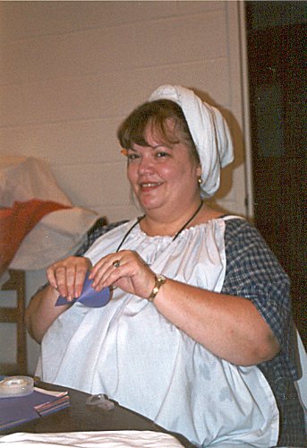 THLady Molli Rose Kekilpenny at Hearth & Home Collegium in November A.S. XXXVI (2001)